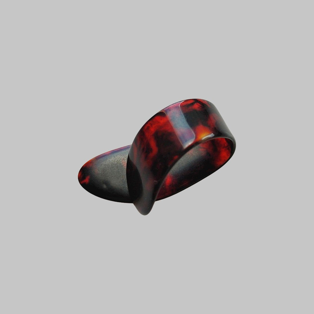 Uñeta o púa de dedo marca Alice, material celuloide
