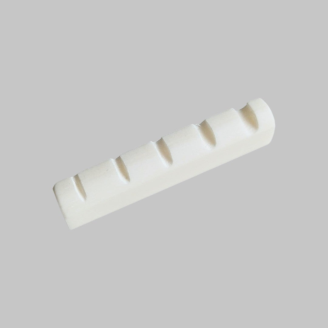Cejilla superior para bajo eléctrico de 5 cuerdas marca Memphis, material hueso