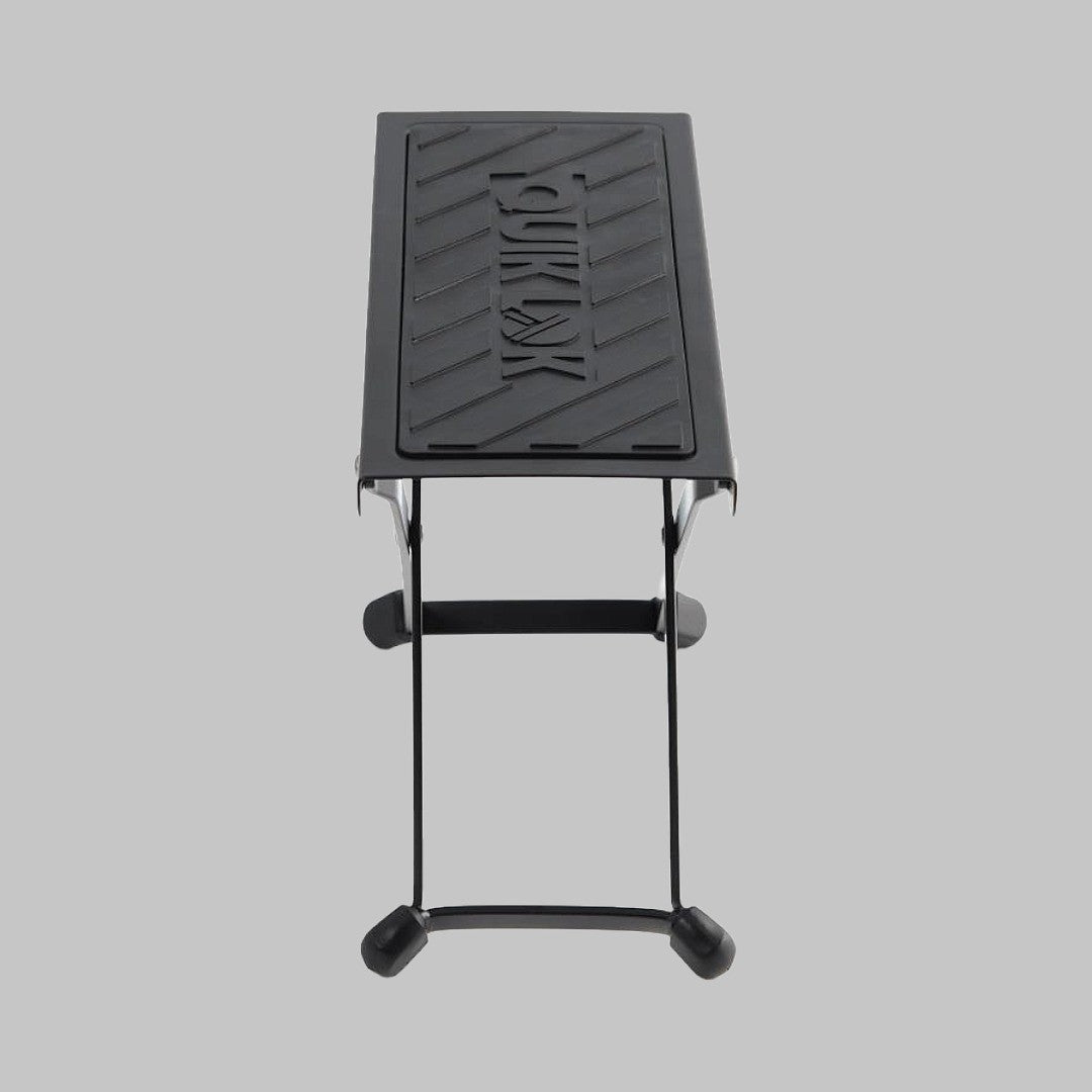 Soporte apoya pie para guitarrista marca Quik Lok