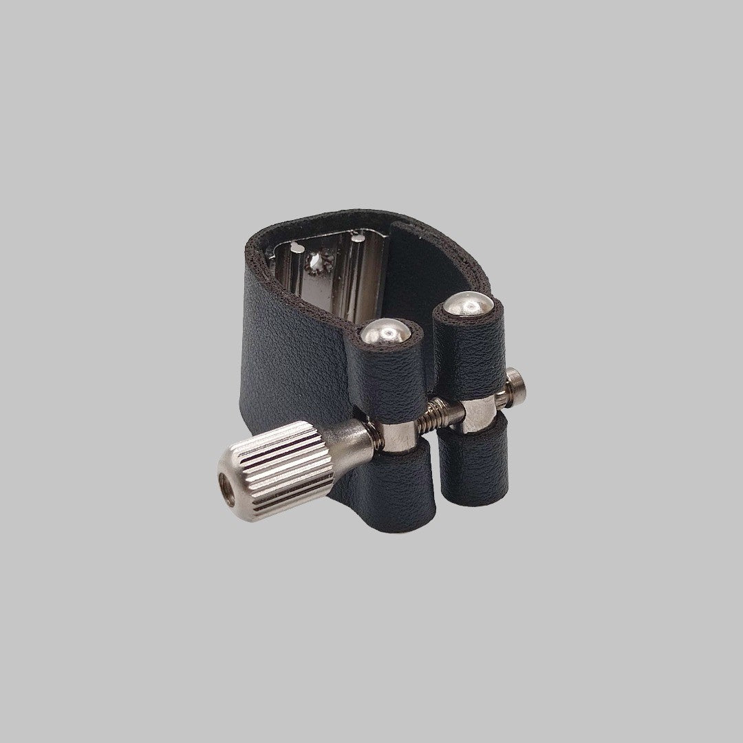Abrazadera de cuero para boquilla de saxofón alto y tenor marca Venezia