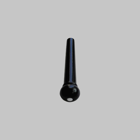 Pin prensa cuerda para guitarra marca Alice, color negro con punto blanco
