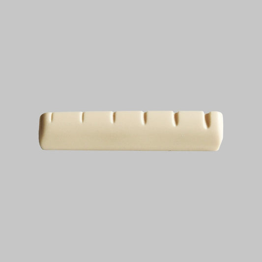Cejilla superior para guitarra acústica y eléctrica marca Alice, material plástico ABS