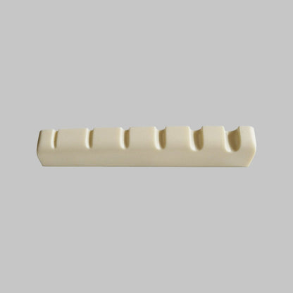 Cejilla superior para bajo eléctrico de 6 cuerdas marca Alice, material plástico ABS