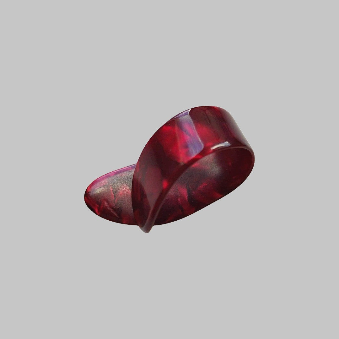 Uñeta o púa de dedo marca Alice, material celuloide, (7 colores)