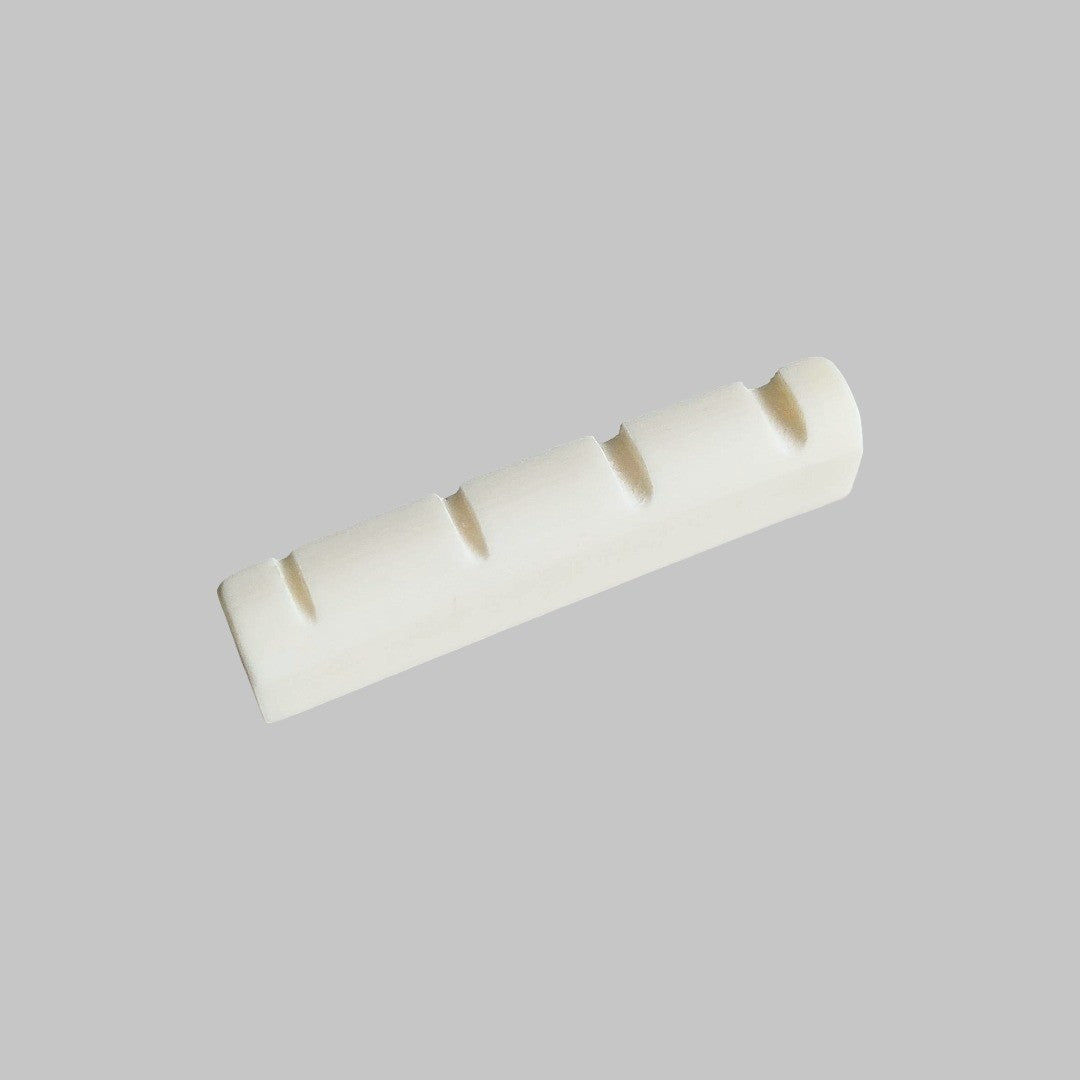 Cejilla superior para bajo eléctrico de 4 cuerdas marca Memphis, material hueso