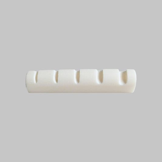 Cejilla superior para bajo eléctrico de 5 cuerdas marca Memphis, material hueso