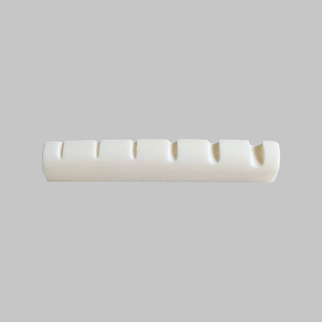 Cejilla superior para bajo eléctrico de 6 cuerdas marca Memphis, material hueso