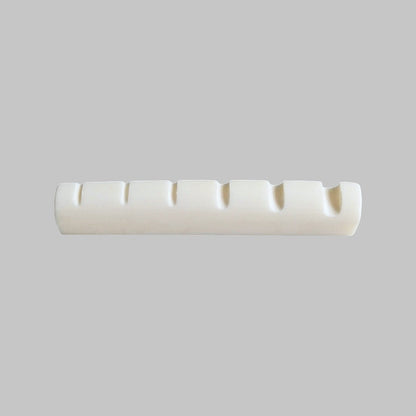 Cejilla superior para bajo eléctrico de 6 cuerdas marca Memphis, material hueso
