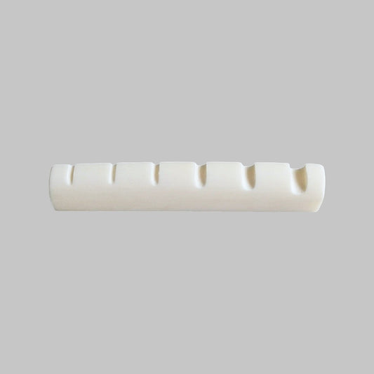 Cejilla superior para bajo eléctrico de 6 cuerdas marca Memphis, material hueso