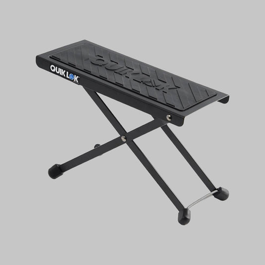 Soporte apoya pie para guitarrista marca Quik Lok