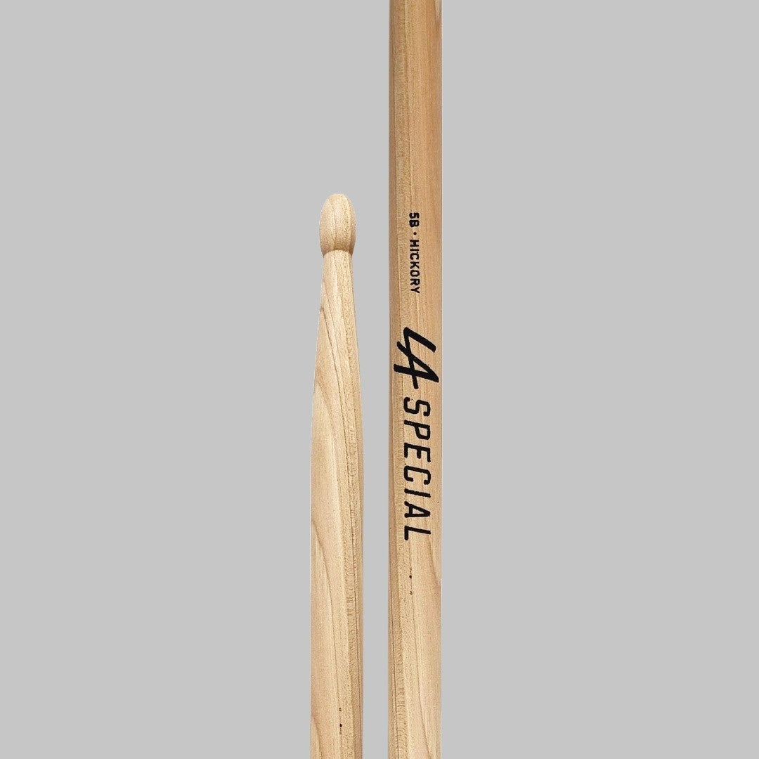 Baquetas para batería 5B marca Promark, madera hickory, punta de madera